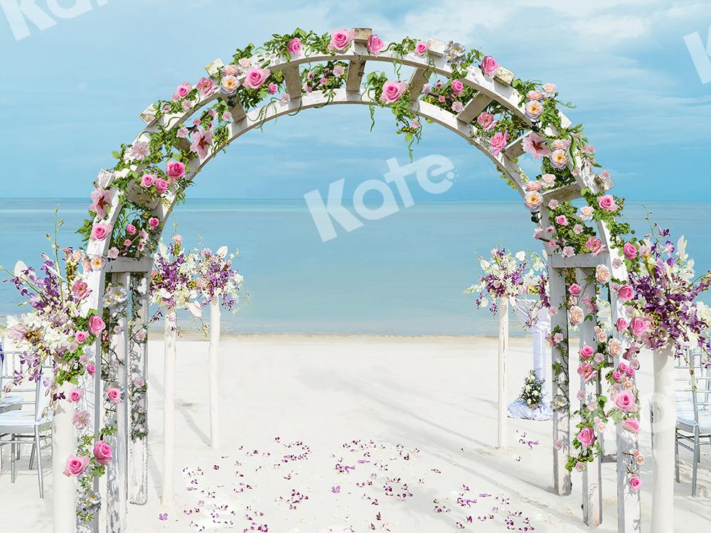 Kate Hochzeitshintergrund Strand Blumen Bogen entworfen von Chain Fotografie