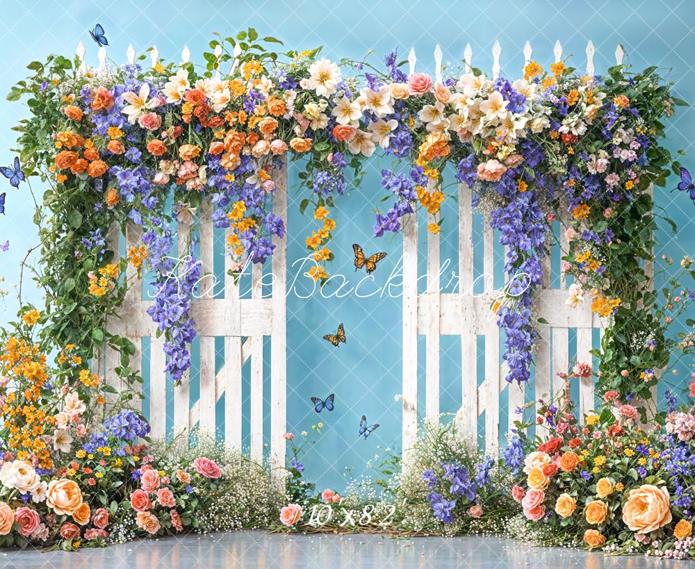 Kate Sommer Feine Kunst Bunte Blumenbogen Weißer Holzzaun Blaue Wand Hintergrund Entworfen von Chain Photography - Kate Backdrop.de