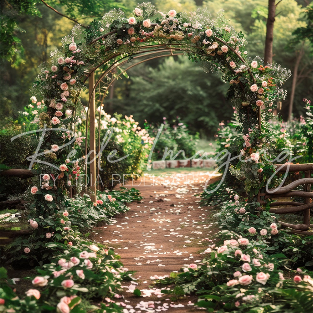 Kate Sommer Outdoor Wald Hochzeit Pinker Blumenbogen Pfad Hintergrund entworfen von Lidia Redekopp - Kate Backdrop.de