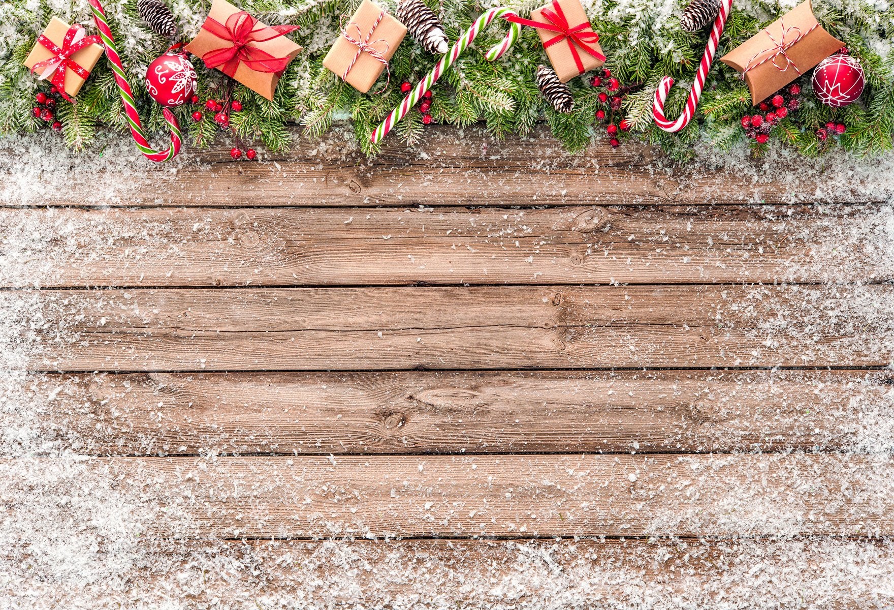 Kate-Weihnachtsgeschenk-Holzfußboden mit Schnee-Hintergrund Fotografie
