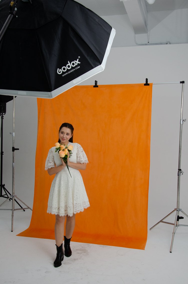 Kate einfarbig Orange Hintergrund Porträt Fotografie